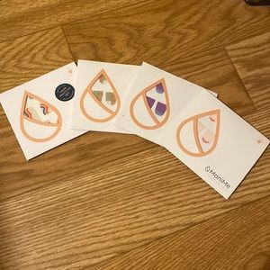 Four Sets of Mani-Me Nail Stickers